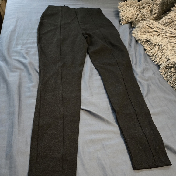 Express Black leggings with permanent crease down the leggings and back of legs. - Picture 4 of 5